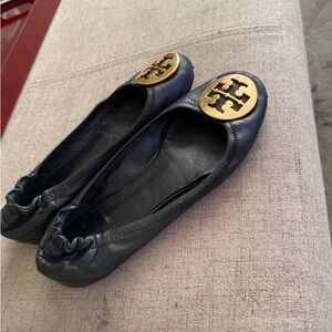 Well worn leather flats